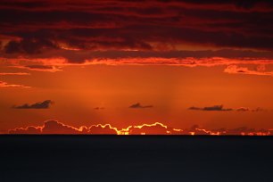 Glutroter Sonnenuntergang Wandbild