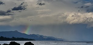 Regenbogen am Meer Wandbild