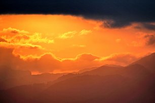 Wolkengluehen Wandbild