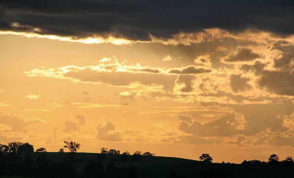 Leuchtende Wolken Abend Himmel Wandbild