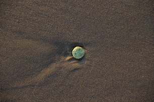 Stein im Sand Wandbild