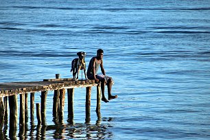 Mann mit Hund Wandbild