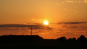 Goldener Sonnenuntergang Wandbild